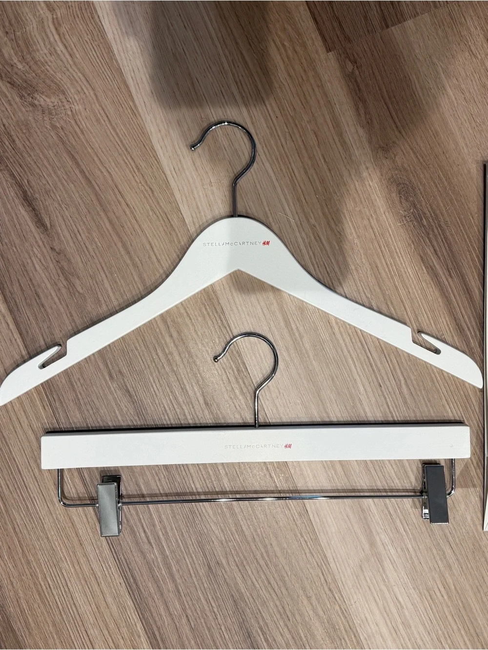 Stella McCartney H&M White Branded Shopping Bag with White Wooden Hangers
